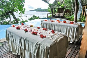 Outdoor massage overlooking the infinity pool at the Duavata villa at the Namale resort in Fiji