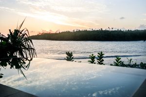 Sunset over the Nanise private pool at the Namale resort in Fiji