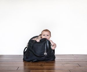 Lo and Sons O.G. Bag baby model in bag